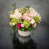 Same day delivery at Beverly Hills Florist ! Breathtaking medley of beautiful pink Ecuadorian roses and spray roses, peonies, cymbidium orchids, lime green accents and other seasonal floral that are artistically arranged to create this stunning design in a white rocks glass vase. The pink-white lime is a delightful combination to express happiness!