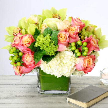 Happiness Blooms Floral Arrangement with Green Hydrangeas, Orange Roses, and Dutch Orchids
Imported Green Hydrangeas and Orange Roses in Happiness Blooms Arrangement
Elegant Happiness Blooms Arrangement for Same-Day Delivery Beverly Hills