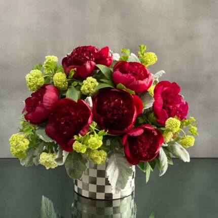 This arrangement our team has created is available for same day delivery ! This floral piece from Beverly Hills Florist includes rich burgundy Peonies with green accents in a shiny checkered vase. Beautifully made for love and romance, birthday, i'm sorry or anniversary.