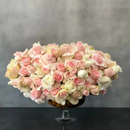 Designed to be the ultimate expression of your affection our team at Beverly Hills Florist can arrange our Passion in Pink for same day delivery. In our floral piece we have over 100 stems of Light Pink and white South American Roses are exquisitely arranged in a container. This is sure to leave an impression that's impossible to forget! A notion of sincerity making it wonderful for love and romance, thinking of you, congratulations, welcomes and more !