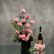Beverly Hills Florist presents 2 dozen pink roses accented with greenery and branch in a black ceramic vase for same day delivery. Our product includes, Veuve Clicquot, bath salts, hand lotion and bath soap. A thoughtful love and romance gift, thank you gift and perfect for a nice celebration !