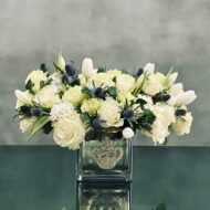 Beverly Hills Florist presents a variety of White Roses and Tulips, accented with Thistles in a silver vase. Made sure to shine with its bejeweled  crown ! Available for same day delivery. Making it a perfect fit for Love and Romance, Birthday or a thank you !