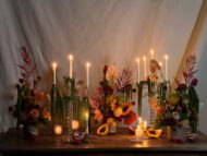 Lush arrangement of amaranths, anthuriums, and vibrant papayas in a white vase – Elegant Blooming Beauty, available for same-day delivery by Beverly Hills Florist.