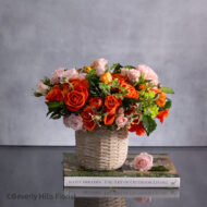Sunset Serenade Pink Spray Roses in Ceramic Basket Arrangement
Elegant Pink Roses Arrangement in Basket for Same-Day Delivery Beverly Hills
Charming Orange and Pink Flower Arrangement for Los Angeles Delivery