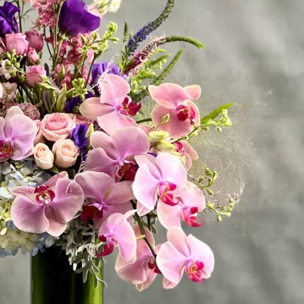 Beverly Hills Florist presents same day delivery for our "Liberty" arrangement. Our team has put together a beautiful land vast floral piece that includes various flowers. These flowers are Hydrangeas, Orchids, Dusty Miller and more. Beautifully pieced for a Birthday, Thinking of You, Thank you, Love and Romance and more.