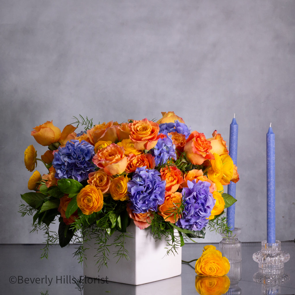 Same_day_delivery_Los_angeles_flowers-1 The Tale of Orange Roses and Blue Hydrangeas Arrangement
Luxury Orange Garden Roses and Blue Hydrangeas in White Vase
Sunburst Floral Arrangement for Same-Day Delivery Beverly Hills
Vibrant Orange and Blue Floral Arrangement Los Angeles Delivery