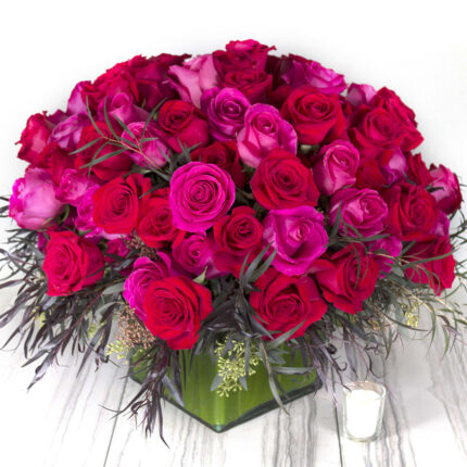 Love, Love, Love! A cluster 100 gorgeous red and pink Roses are encircled by a bed of feathery and airy mix of greens to create this eye-catching and dramatic statement of color, beauty, and love. Beverly Hills Florist creates Wild Strawberries for same day delivery! Love and Romance flowers, Birthday flowers, Thinking of you flowers