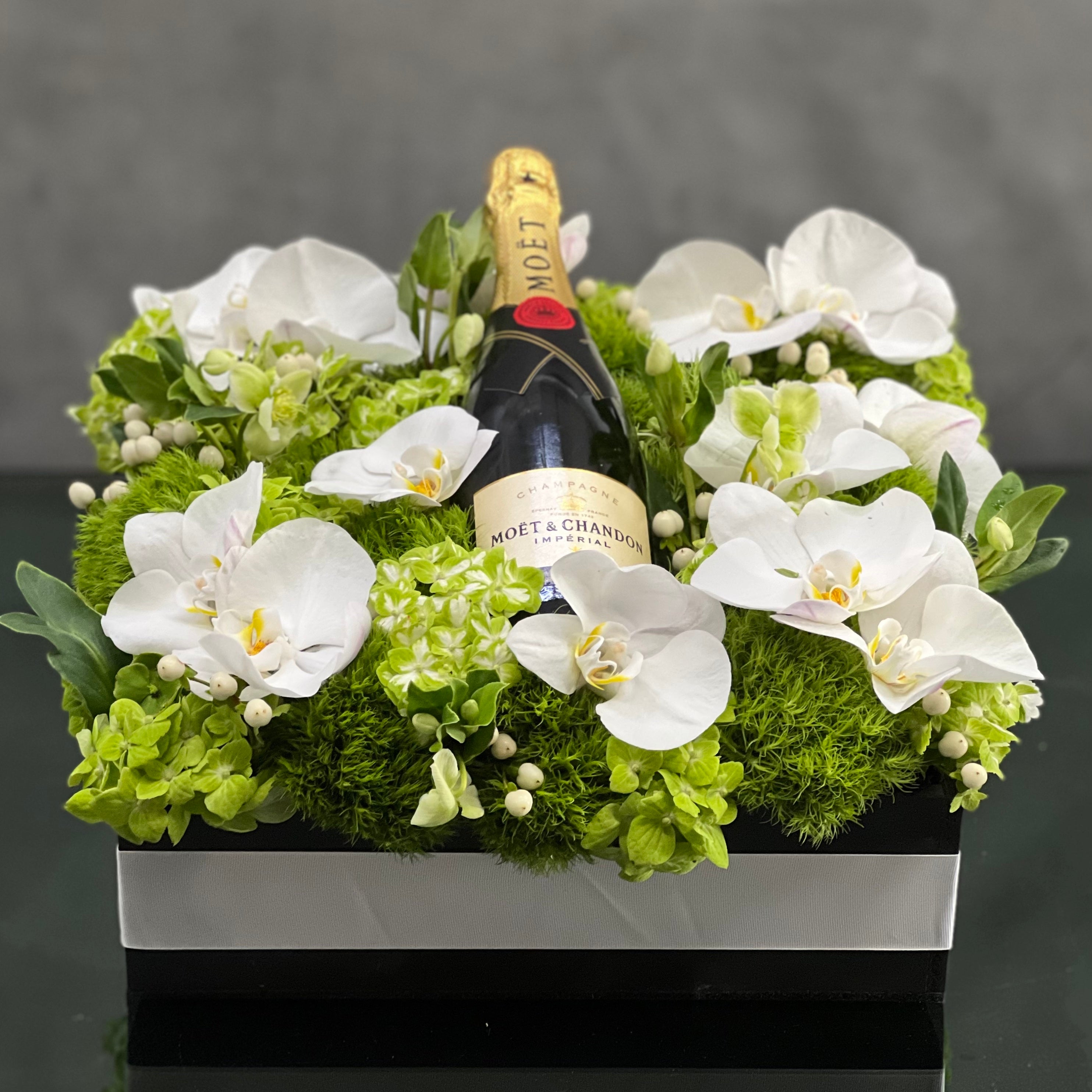 moet_orchidbox_floral_giftbox1 Beverly Hills Florist presents this luxury Moet floral box with orchids and other locally sourced flowers. 24 inch square box. for same day delivery !