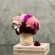 Beverly Hills Florist presents our "Funky Fresh" arrangement for same day delivery! A variety of colorful flowers accented with Orchids. A fun touch for a welcome home, birthday, office decor or a unique way of saying thank you.