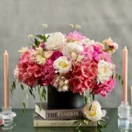 If you're looking for the unique and stunning, this design is it by My Beverly Hills Florist that can be delivered same day! The matte black vase holds a blossom-filled cluster of a variety of pink and white peonies, spray roses and pink hydrangeas. It's chic and in a class of it's own. A specialty look for that someone special. Birthday flowers, Love and Romance flowers, Thank you flowers, Congratulation flowers.